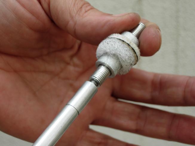 Using thumb pressure screw the Borekisser onto the threaded 8-32 bolt.
